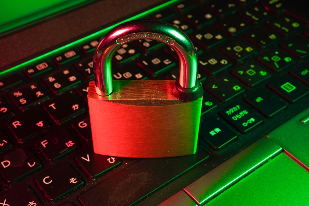 Digital encryption shield protecting Apple MacBook and iPhone from cyber threats
